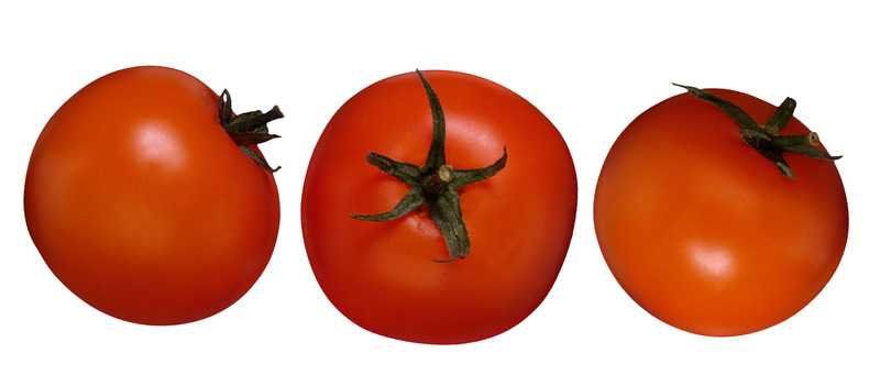 three tomatoes in a line