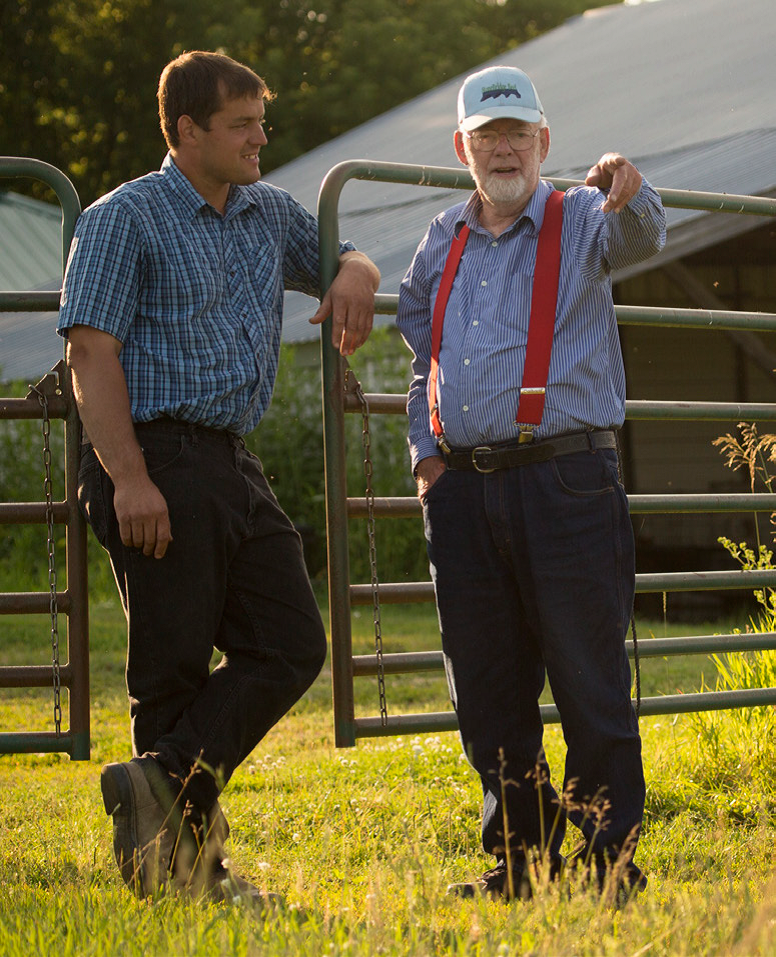 Lester and Mike talk on the farm