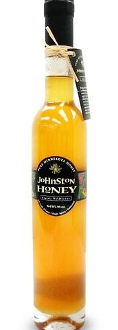 Glass bottle of honey