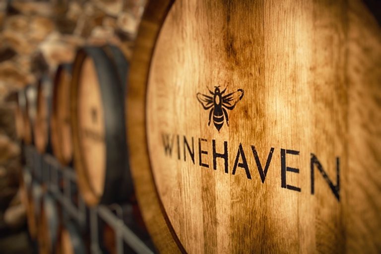 Professional photo of a slated multi-dimensional photowine barrels with the logo
