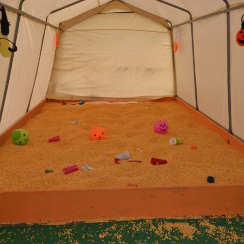 covered corn play pit