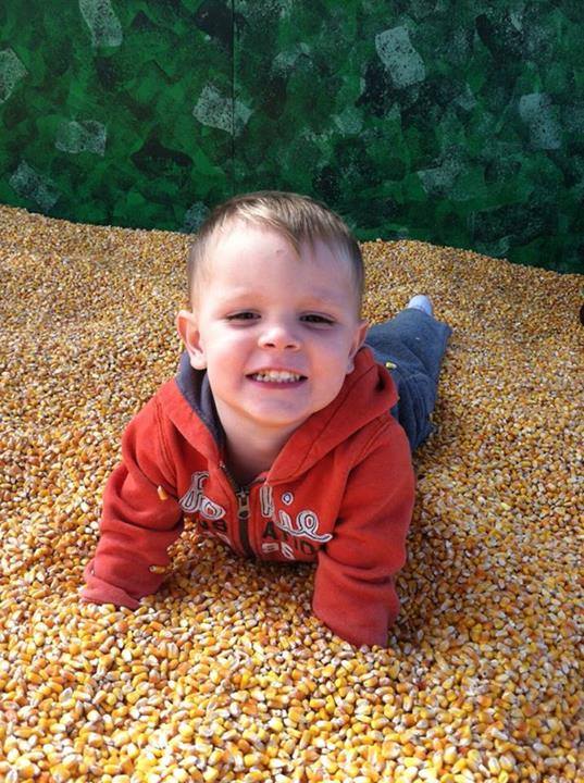 2019 04 12 Waldoch Farm Submitted child playing in corn kernel pit