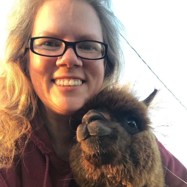 Farmer Jessica with an alpaca