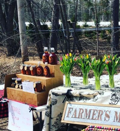 Farm stand featuring maple syrup