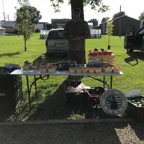 vendor selling fresh vegetables