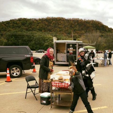 vendor selling baked goods at the market