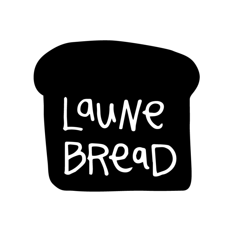 Logo that features a black outline of a slice of bread with the words "Laune Bread" inside the slice in white text.