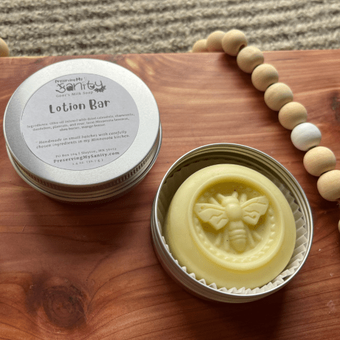 Infused lotion bar with honey bee embossed