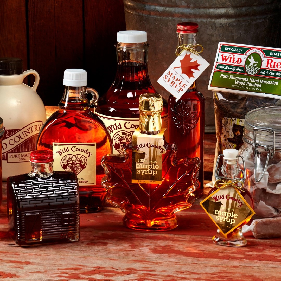 An assortment of maple syrup bottles.