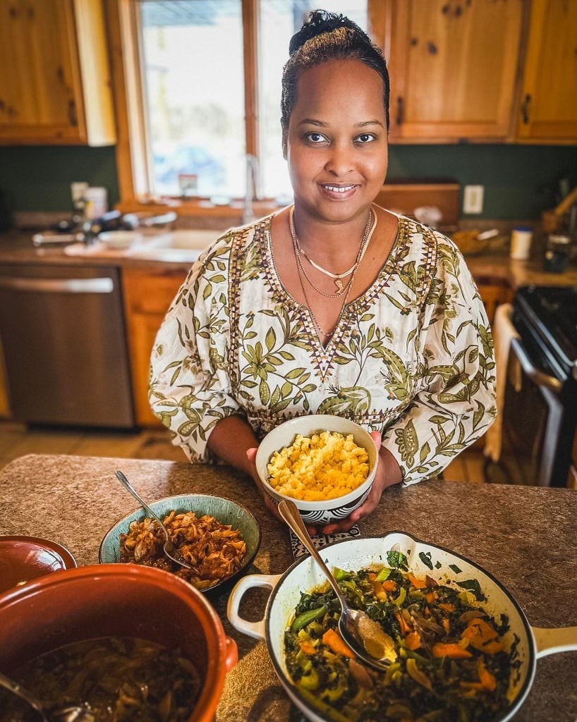 2025.03 Taken by Mallory Forseth Ramadan recipe Naima recipe creator holding prepared dish 2