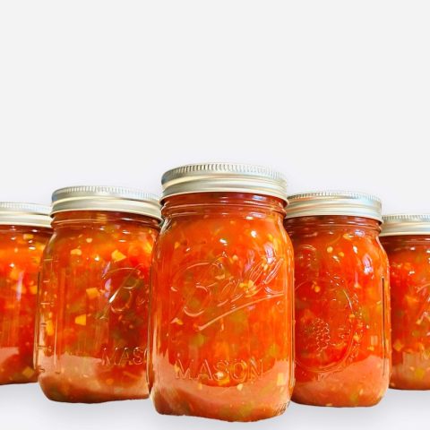 Picture of five jars of salsa against a white background.