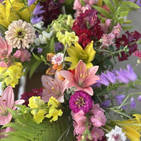 a close up of a multicolored bouquet
