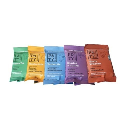 five granola bars in colored packages: from left to right, green, yellow, blue, purple, red