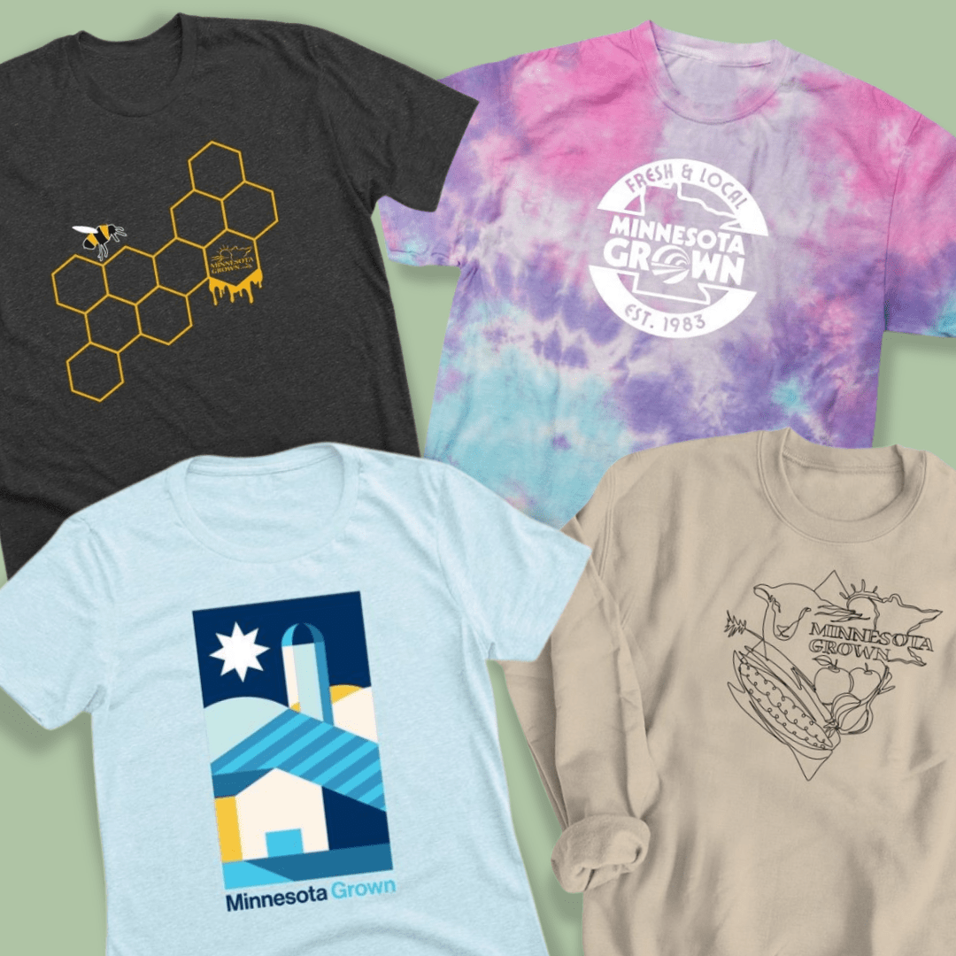 An assortment of Minnesota Grown shirts in different styles.