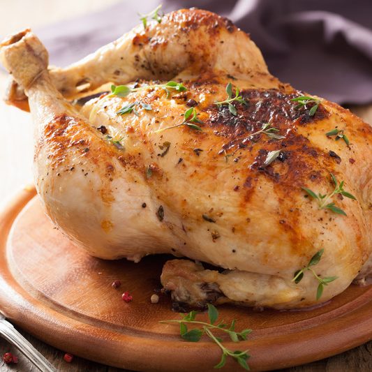 whole roasted chicken with pepper and thyme